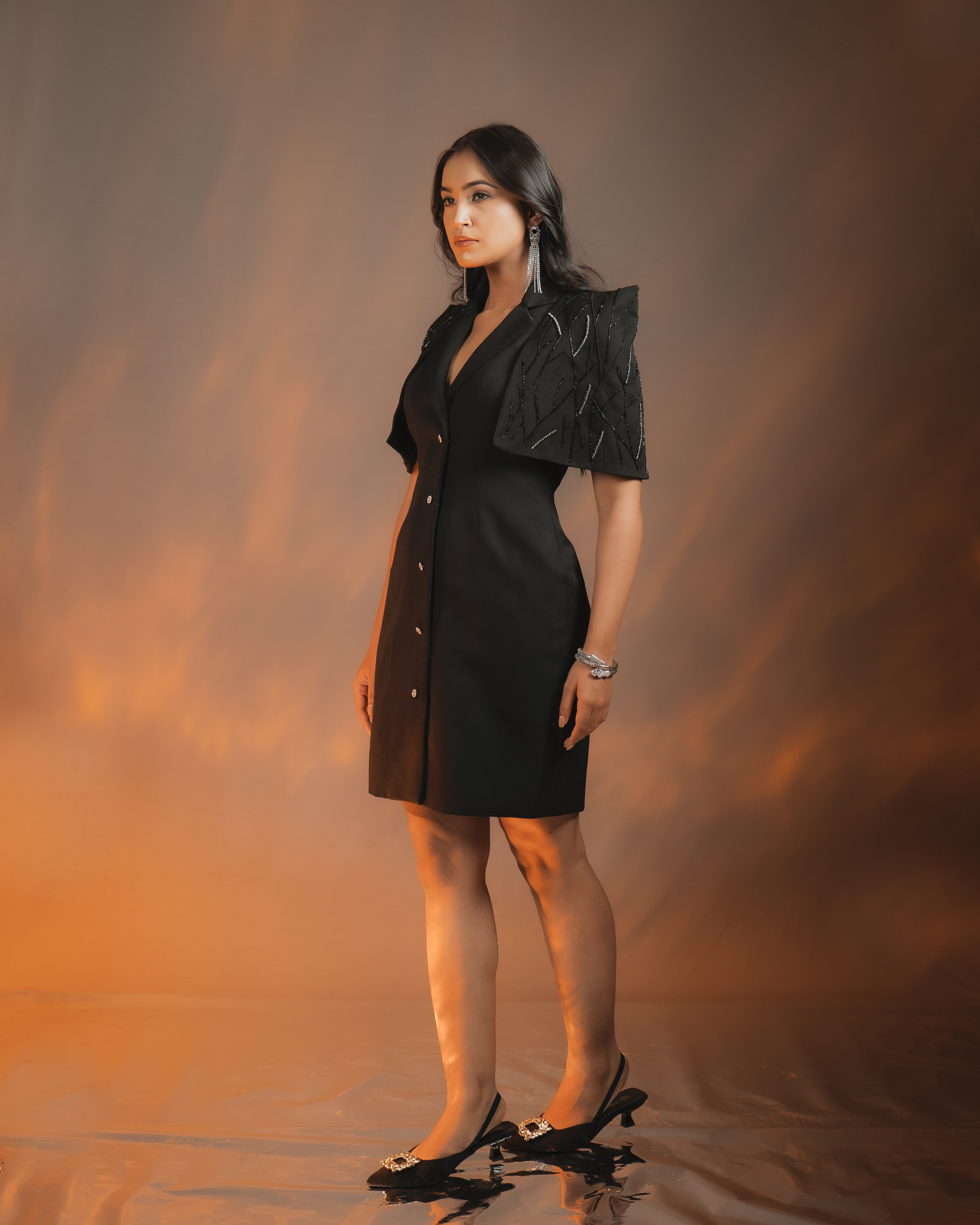 ZEN BLAZER DRESS BLACK featuring embellished cape sleeve and Swarovski Crystal button, luxury crepe fabric.